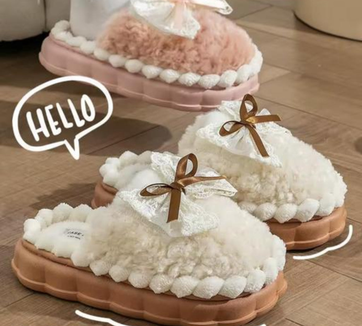 Fluffy creme slippers